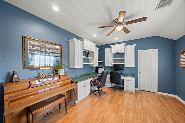 20306 Silverwood Trl, Cypress, TX 77433 - home office featuring ceiling fan, built in desk, light wood-type flooring, lofted ceiling, and recessed lighting
