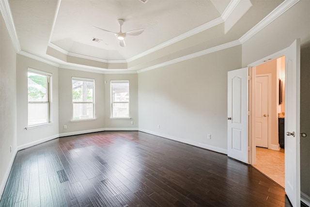 13918 Twisting Ivy Ln, Cypress, TX 77429 - unfurnished room featuring a raised ceiling, a ceiling fan, dark wood-type flooring, ornamental molding, and baseboards