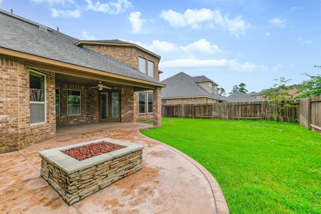 13918 Twisting Ivy Ln, Cypress, TX 77429 - view of yard with a fire pit, a ceiling fan, a patio, and french doors