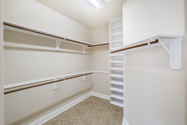 13918 Twisting Ivy Ln, Cypress, TX 77429 - spacious closet with light tile patterned floors