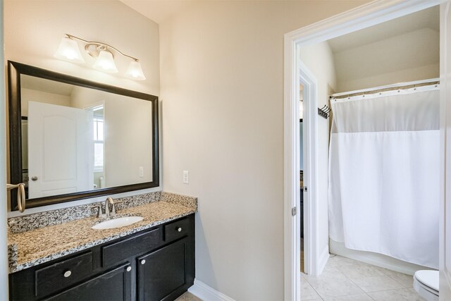 13918 Twisting Ivy Ln, Cypress, TX 77429 - full bath with vanity, toilet, tile patterned floors, and baseboards