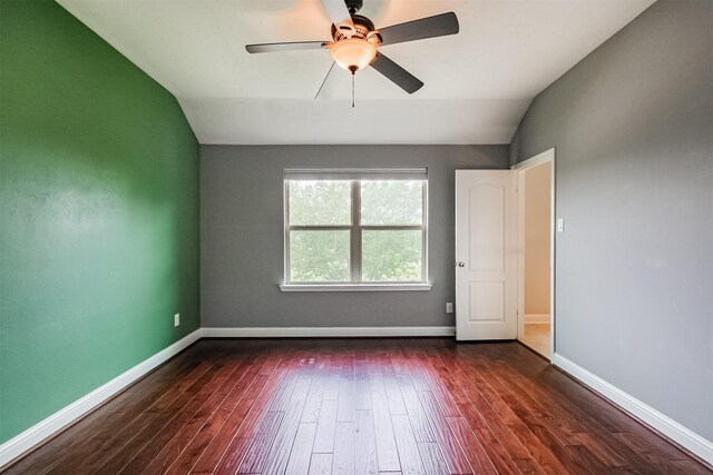 13918 Twisting Ivy Ln, Cypress, TX 77429 - empty room featuring lofted ceiling, dark wood-type flooring, a ceiling fan, and baseboards