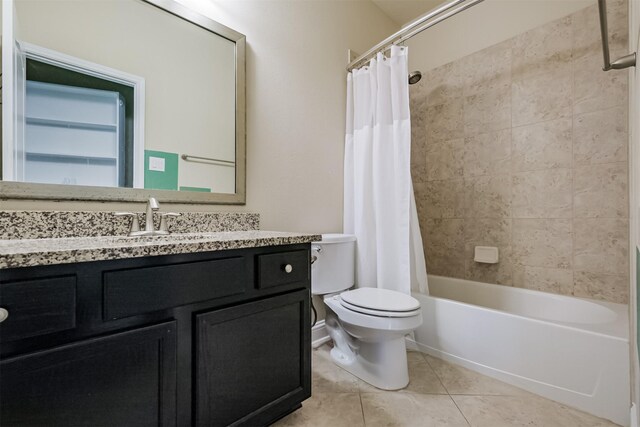 13918 Twisting Ivy Ln, Cypress, TX 77429 - bathroom with toilet, vanity, shower / bath combo with shower curtain, and tile patterned flooring
