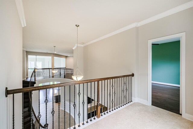 13918 Twisting Ivy Ln, Cypress, TX 77429 - hall with ornamental molding, tile patterned floors, baseboards, and an upstairs landing
