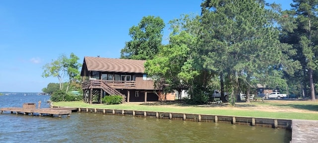 15088 Cozy Cove Ln, Willis, TX 77318 - dock with a deck with water view