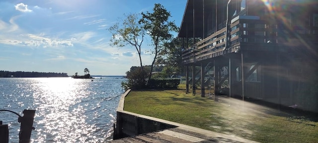 15088 Cozy Cove Ln, Willis, TX 77318 - dock area featuring a water view and a yard