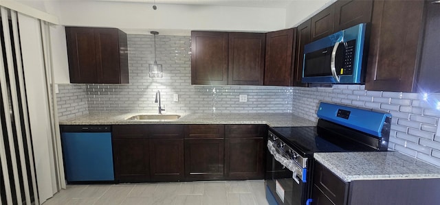 12819 Carvel Ln, Houston, TX 77072 - kitchen with stainless steel appliances, a sink, backsplash, dark brown cabinets, and light stone countertops