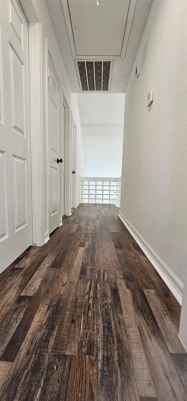 12819 Carvel Ln, Houston, TX 77072 - hall with attic access, hardwood / wood-style flooring, and baseboards