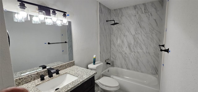 12819 Carvel Ln, Houston, TX 77072 - full bathroom featuring vanity, washtub / shower combination, toilet, and a textured wall