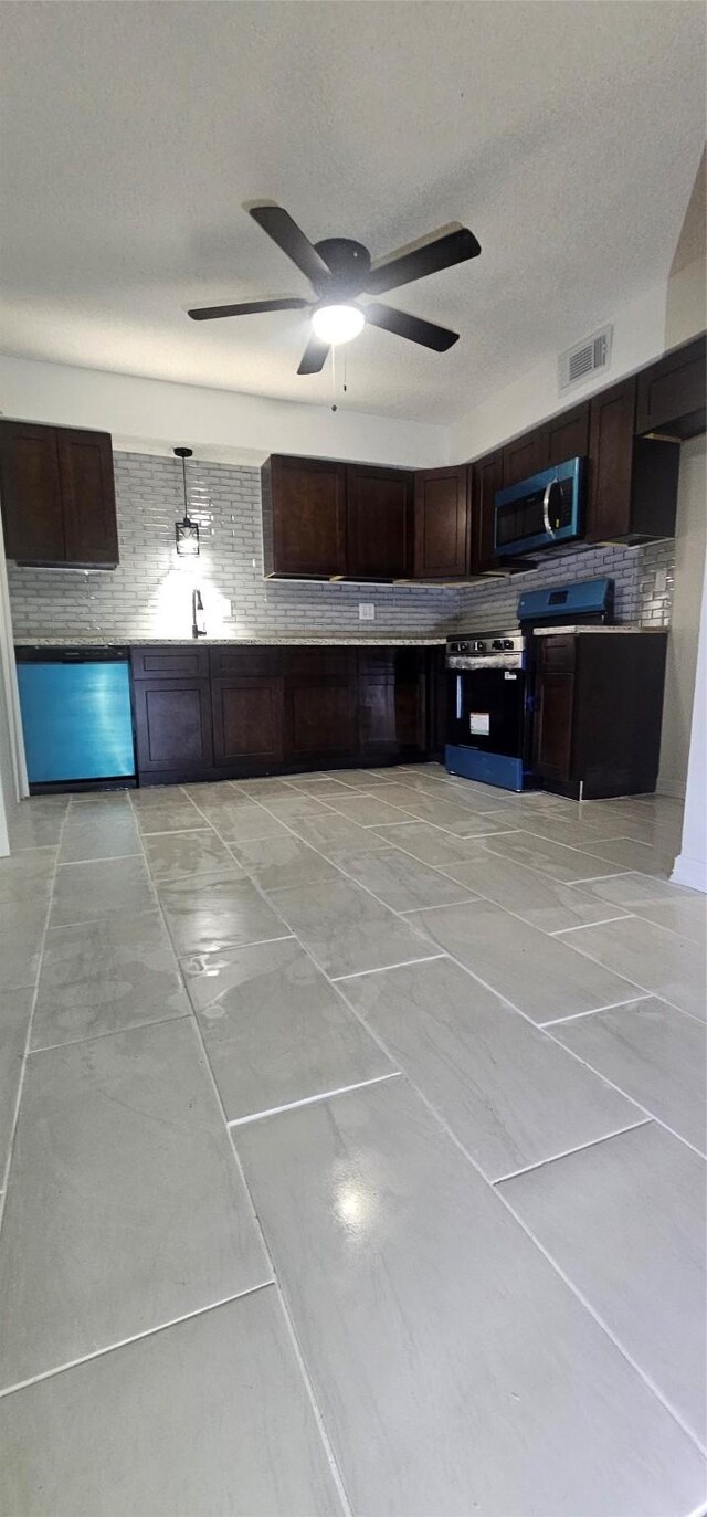 12819 Carvel Ln, Houston, TX 77072 - kitchen featuring appliances with stainless steel finishes, backsplash, ceiling fan, dark brown cabinets, and a textured ceiling