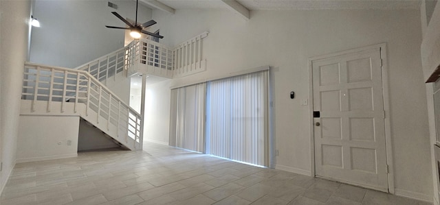 12819 Carvel Ln, Houston, TX 77072 - foyer entrance with ceiling fan, beamed ceiling, high vaulted ceiling, stairway, and baseboards