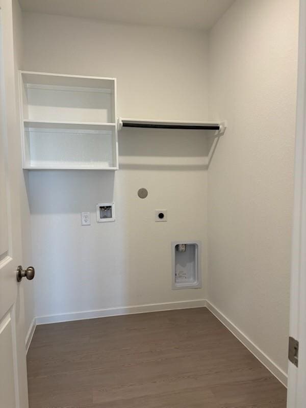 419 Robin St, Angleton, TX 77515 - laundry room featuring electric dryer hookup, dark wood-style flooring, washer hookup, and baseboards