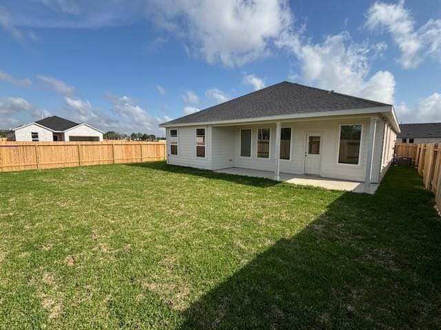 419 Robin St, Angleton, TX 77515 - rear view of house with a patio