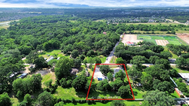 25203 Lakeview Rd, Katy, TX 77494 - aerial view of property and surrounding area with property boundaries highlighted and a heavily wooded area