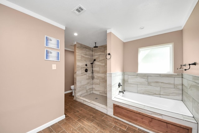 25203 Lakeview Rd, Katy, TX 77494 - bathroom with a garden tub, tiled shower, toilet, ornamental molding, and baseboards
