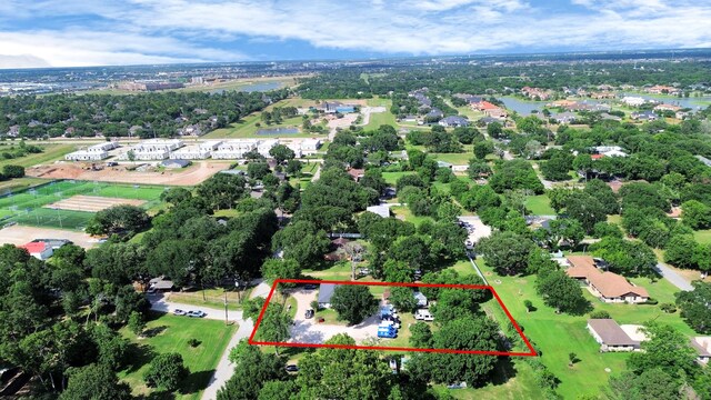 25203 Lakeview Rd, Katy, TX 77494 - view of property location with property boundaries highlighted, a tree filled landscape, and a nearby body of water