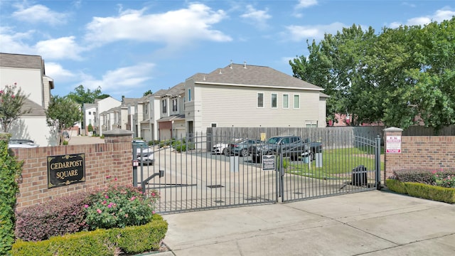 1210 Cedarpost Tree Springs Pl Unit P, Houston, TX 77055 - gate featuring a residential view