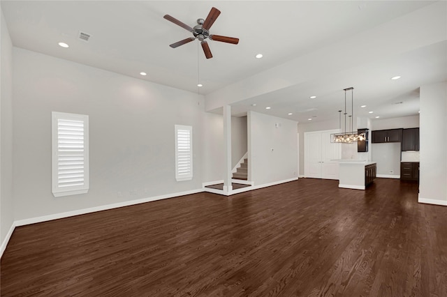 1210 Cedarpost Tree Springs Pl Unit P, Houston, TX 77055 - unfurnished living room with dark wood-style flooring, baseboards, ceiling fan, stairs, and recessed lighting