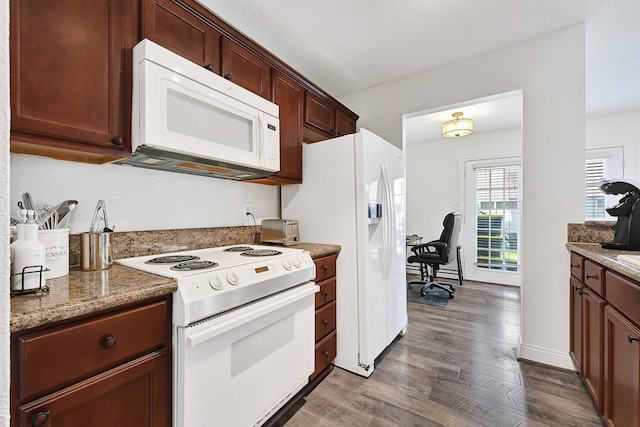 2211 S Kirkwood Rd Unit 26, Houston, TX 77077 - kitchen featuring white appliances, dark wood-style flooring, an office area, stone countertops, and baseboards