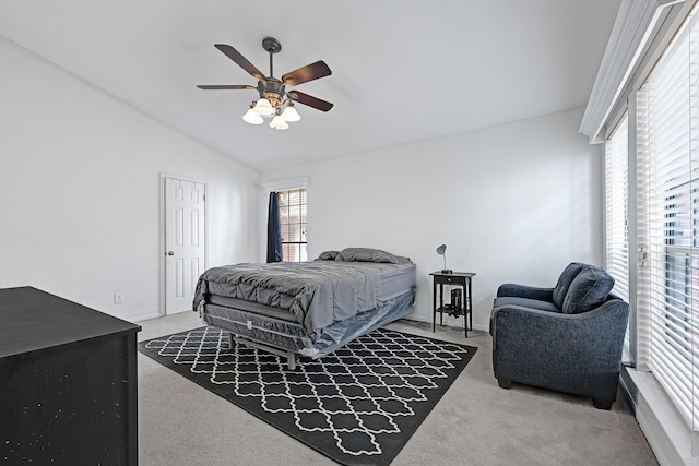 2211 S Kirkwood Rd Unit 26, Houston, TX 77077 - carpeted bedroom with vaulted ceiling, a ceiling fan, and baseboards