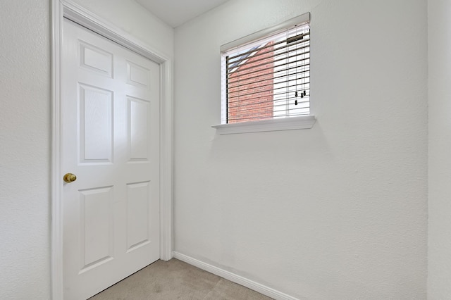 2211 S Kirkwood Rd Unit 26, Houston, TX 77077 - interior space with light carpet and baseboards