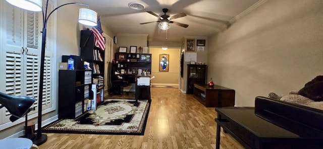 1 Lazy Ln, Bay City, TX 77414 - office area featuring a ceiling fan, wood finished floors, and ornamental molding