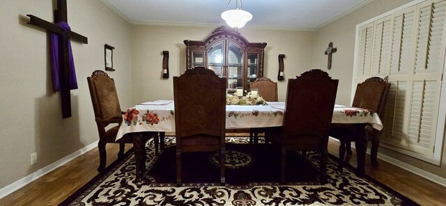 1 Lazy Ln, Bay City, TX 77414 - dining space with wood finished floors, baseboards, and crown molding