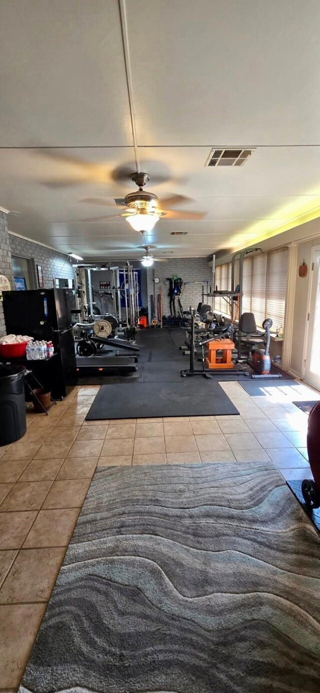 1 Lazy Ln, Bay City, TX 77414 - gym with tile patterned floors and ceiling fan