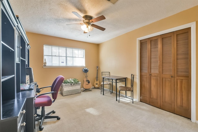 1805 Twila Ln, Conroe, TX 77301 - carpeted home office with a ceiling fan and a textured ceiling