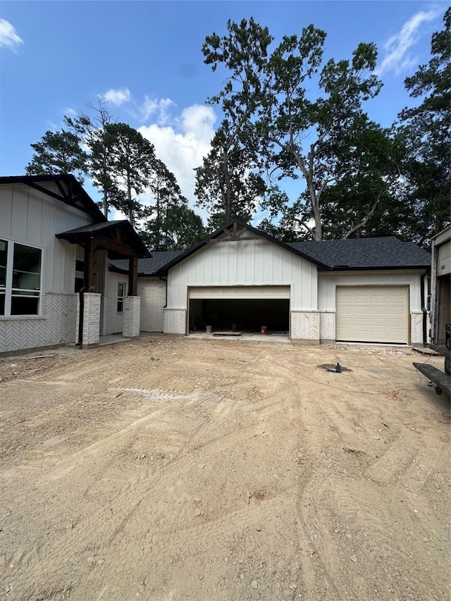 2439 Centurian Cir, Roman Forest, TX 77357 - garage with driveway