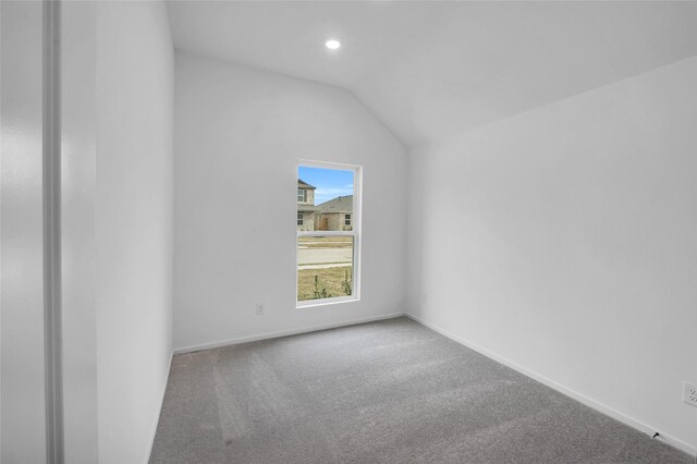 5210 Lake Trout Ln, Baytown, TX 77521 - unfurnished room featuring carpet floors, lofted ceiling, recessed lighting, and baseboards