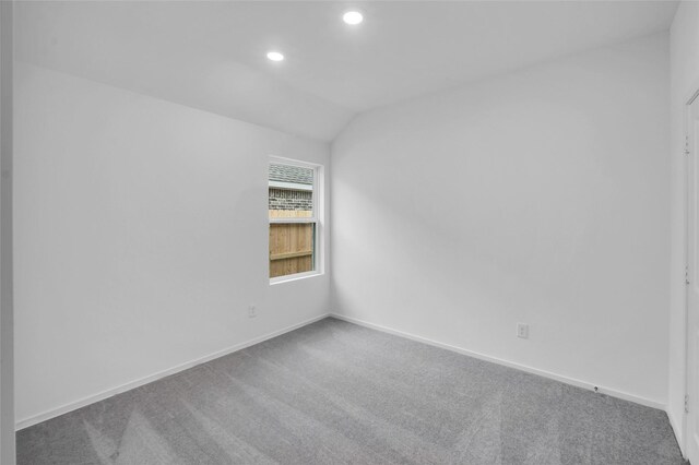5210 Lake Trout Ln, Baytown, TX 77521 - spare room with carpet flooring, recessed lighting, baseboards, and lofted ceiling