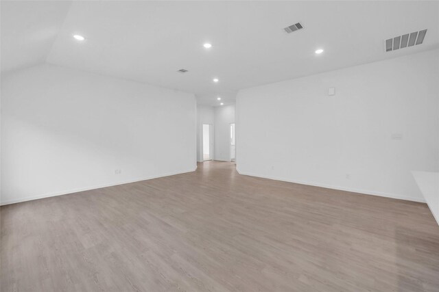 5210 Lake Trout Ln, Baytown, TX 77521 - spare room featuring recessed lighting, light wood-type flooring, and baseboards