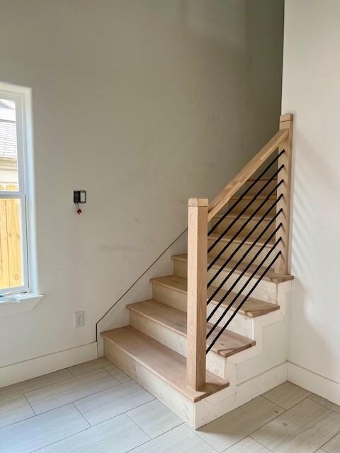7107 Foster St Unit A, Houston, TX 77021 - staircase featuring baseboards