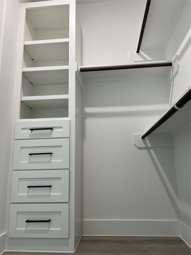 7107 Foster St Unit A, Houston, TX 77021 - spacious closet featuring dark wood finished floors