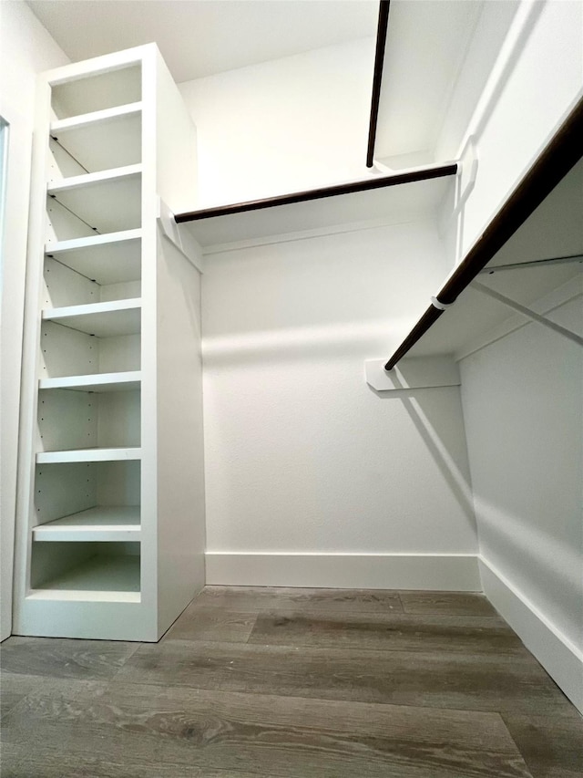 7107 Foster St Unit A, Houston, TX 77021 - walk in closet with wood finished floors