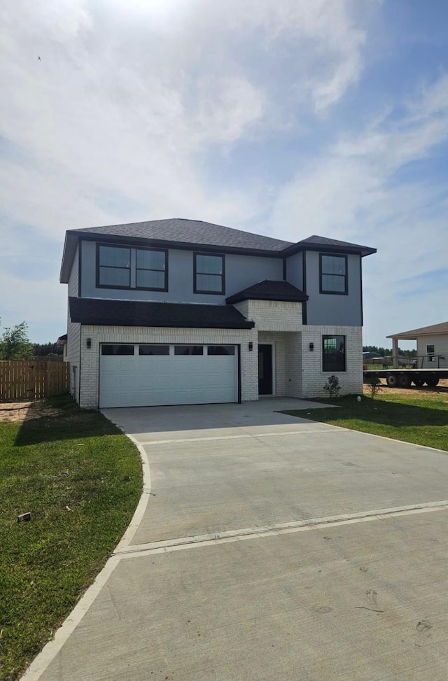 6197 Rd 5503, Cleveland, TX 77327 - view of front of house with an attached garage, concrete driveway, and brick siding