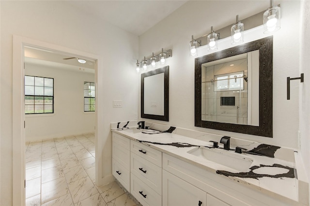 6197 Rd 5503, Cleveland, TX 77327 - bathroom featuring marble finish flooring, double vanity, plenty of natural light, and a shower stall