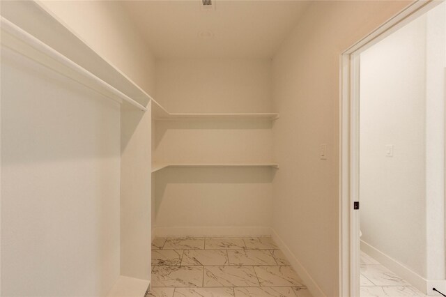 6197 Rd 5503, Cleveland, TX 77327 - spacious closet with marble finish floors