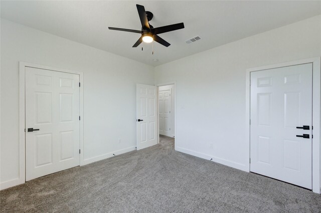 6197 Rd 5503, Cleveland, TX 77327 - unfurnished bedroom with carpet floors, baseboards, and a ceiling fan