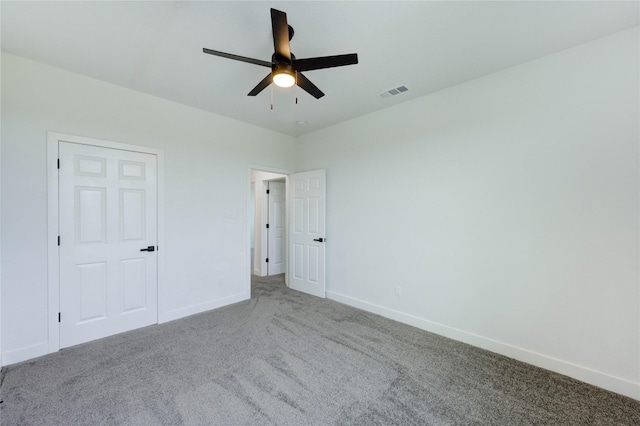 6197 Rd 5503, Cleveland, TX 77327 - unfurnished bedroom with carpet flooring, baseboards, and a ceiling fan