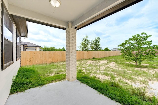 6197 Rd 5503, Cleveland, TX 77327 - fenced yard featuring a patio area