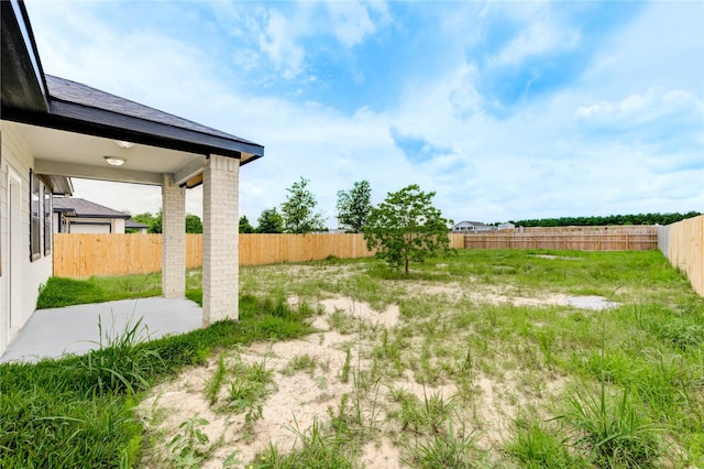 6197 Rd 5503, Cleveland, TX 77327 - fenced backyard featuring a patio