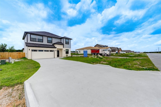 6197 Rd 5503, Cleveland, TX 77327 - view of front facade featuring an attached garage and driveway