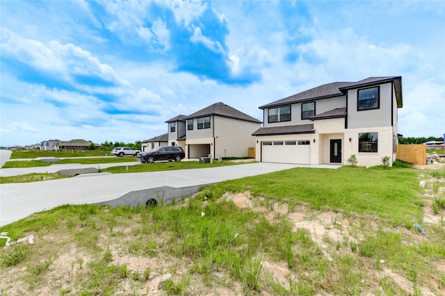 6197 Rd 5503, Cleveland, TX 77327 - view of front of house featuring driveway, an attached garage, and roof with shingles