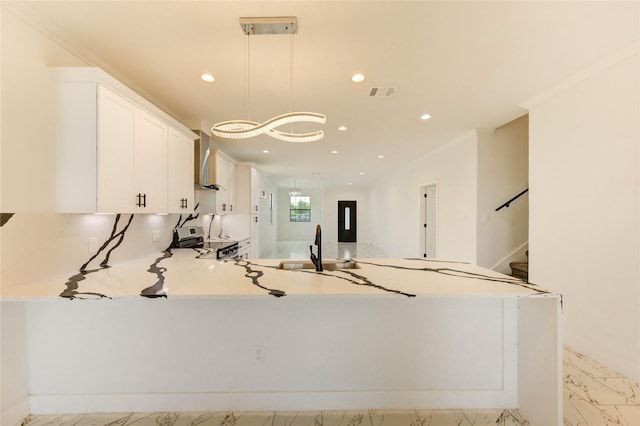 6197 Rd 5503, Cleveland, TX 77327 - kitchen featuring stainless steel electric range, light marble finish flooring, wall chimney exhaust hood, white cabinets, and a peninsula