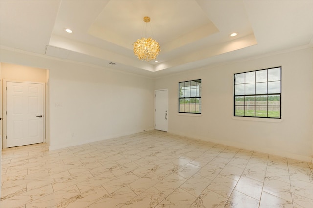 6197 Rd 5503, Cleveland, TX 77327 - spare room featuring a raised ceiling, recessed lighting, a chandelier, and light marble finish flooring