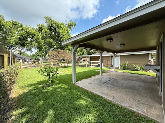 2016 N Tinsley St, Angleton, TX 77515 - view of grassy yard featuring a patio area