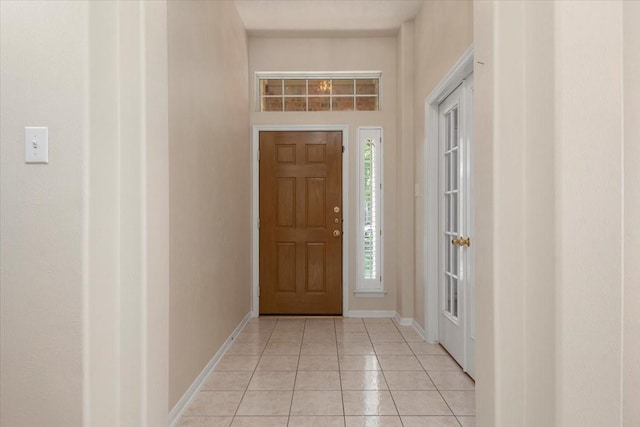 30 Teak Mill Pl, The Woodlands, TX 77382 - foyer with light tile patterned flooring and baseboards