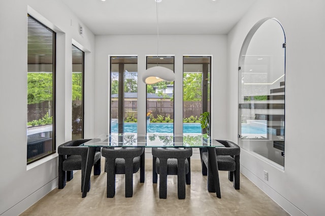 11736 Canyon Ct, Conroe, TX 77385 - dining area with concrete flooring